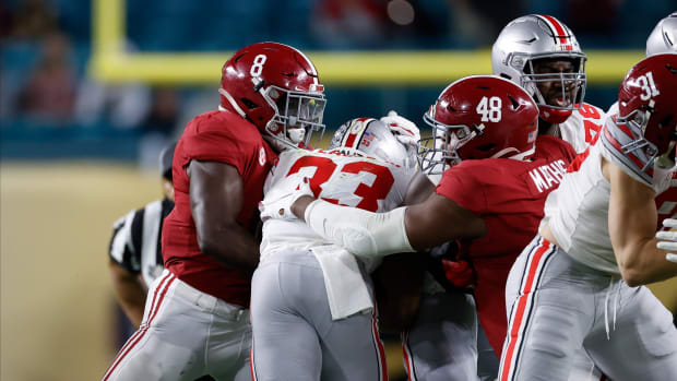 January 11, 2021, Alabama linebacker Christian Harris and defensive lineman Phidarian Mathis in the CFP National Championship in Miami, FL.